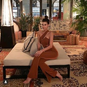 Aqua Jumpsuit. Brand new with tags